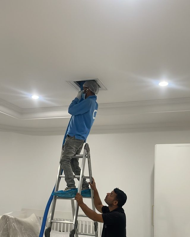 Duct cleaning in a bedroom